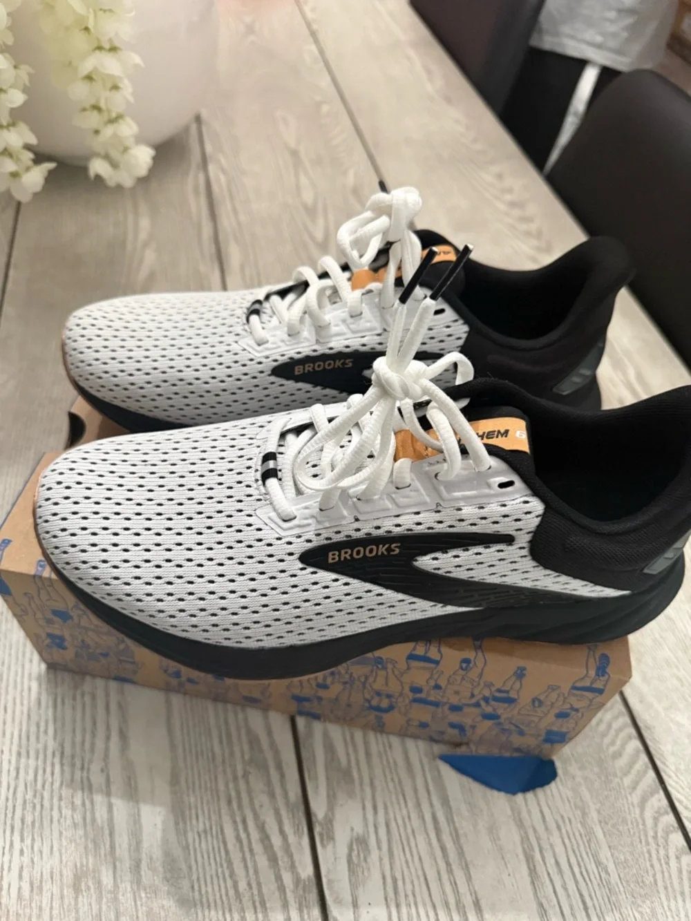 Brooks White and Black Athletic Running Sneakers with Orange Accents